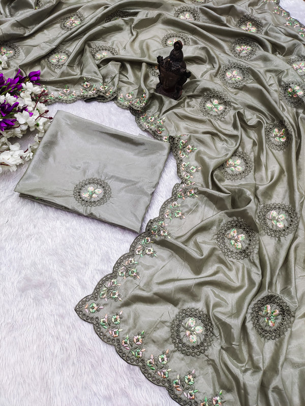 SOPHISTICATED CUTWOTK DESIGN EMBROIDERED IN HEAVY STITCHES SAREE